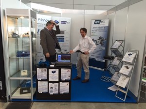 Dana's David Price and Charlie Wartanaby model the company booth at the 2015 Engine Expo in Stuttgart, Germany.